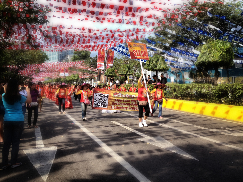 QUICK GUIDE. The QR codes found on banners of Sinulog contingents trigger the download of information about the delegation. It also allows people to “Like” the performances on Facebook. 