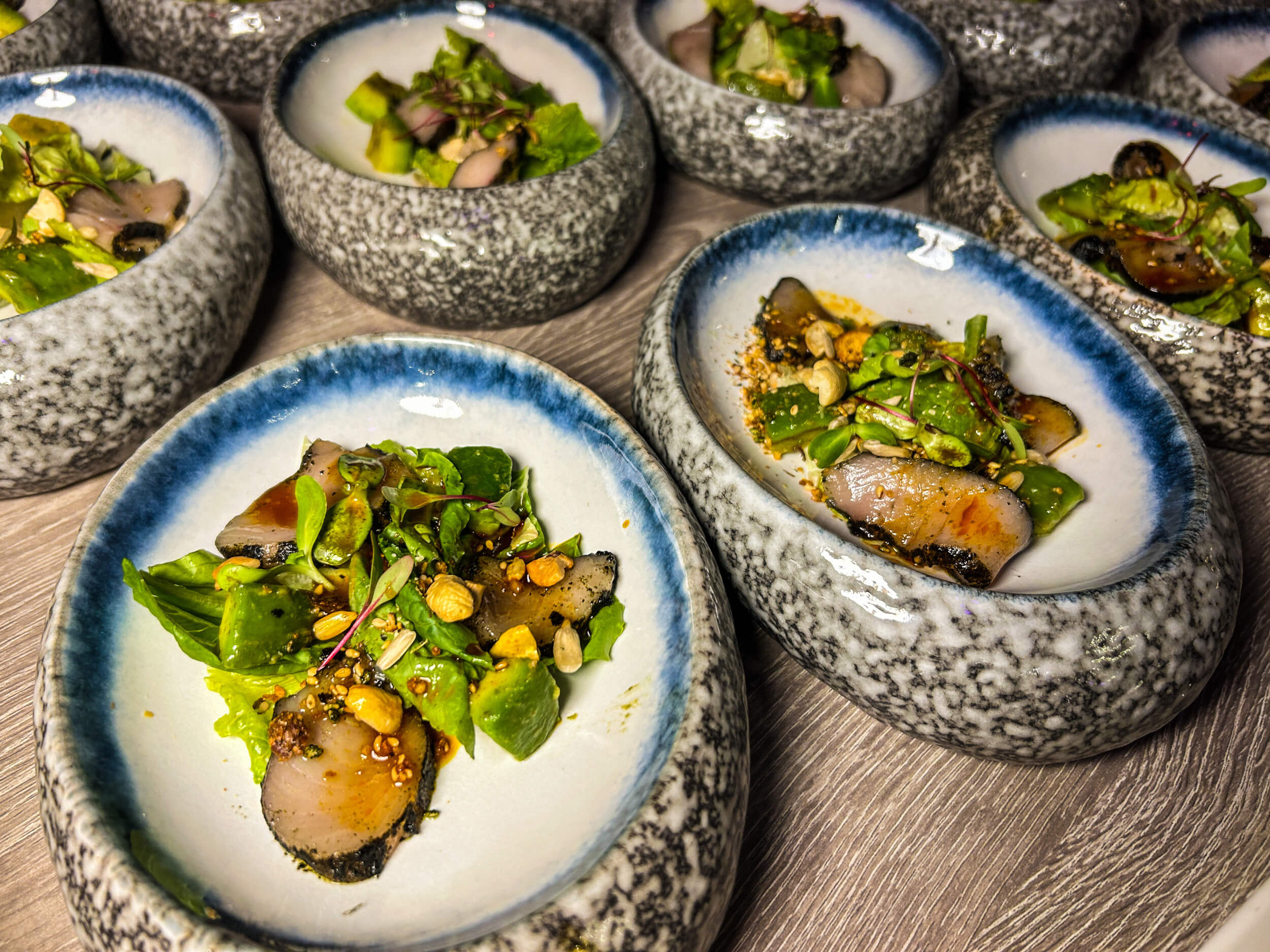 HAMACHI SALAD by Chef Lisa Revilla Thien. The dish is made of nori-crusted hamachi in spiced soy-biasong dressing and cashew nuts.